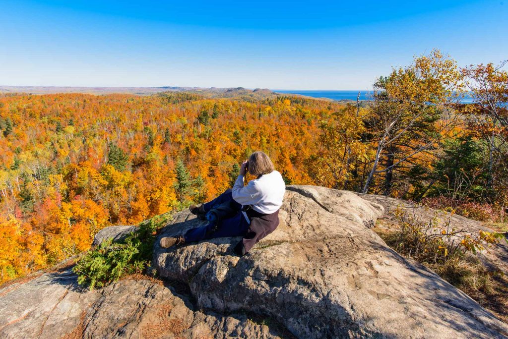 woman photographer outdoors Superior Hiking Trail fall